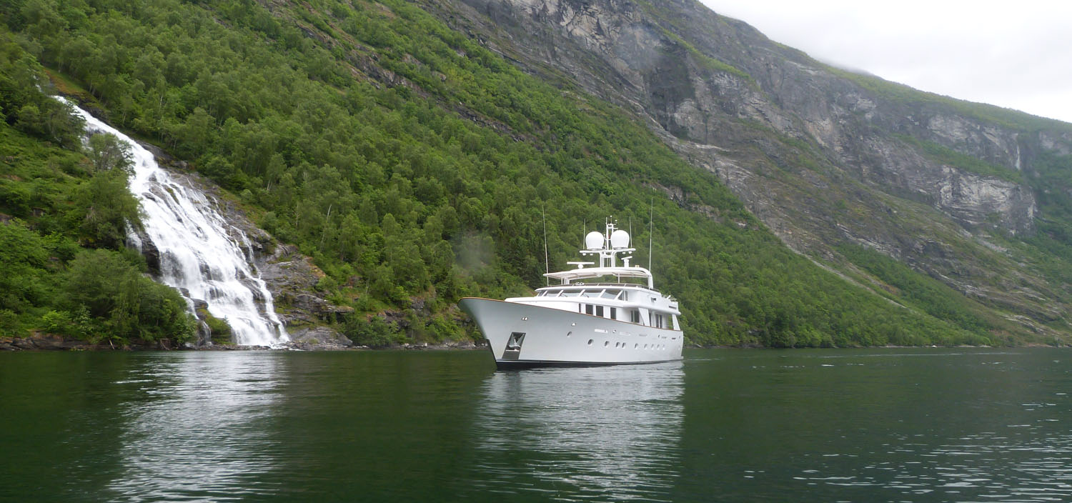 Enjoy dramatic mountains and waterfalls on a Baltic yacht charter